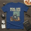 Real Life Is Hard Mode T-Shirt with a knight at a computer and a quest log, designed for gamers and