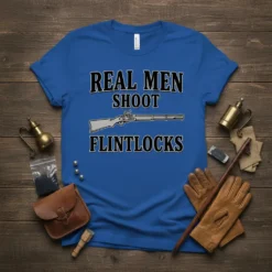 Blue t-shirt with "REAL MEN SHOOT FLINTLOCKS" text and a graphic of a flintlock rifle
