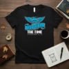 Black t-shirt with "Redeem The Time Ephesians 5:16" text and winged hourglass graphic in blue and white