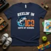 Navy t-shirt with "REELIN' IN 100 DAYS OF SCHOOL" text and a bass fish graphic