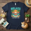 Relaxx With My Cat T-Shirt featuring a cat in a hammock on a tropical beach at sunset
