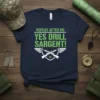 Navy t-shirt with "Repeat After Me Yes Drill Sargent!" text in green and white, featuring crossed rifles and wings graphic