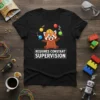 Black t-shirt with a cute red panda wearing a hard hat juggling colorful balls, text reads "Requires Constant Supervision"