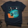 Retro Cat TV T-Shirt with a black cat watching fish on a vintage television, mid-century modern design, starbursts, Sputnik clock