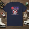 Navy t-shirt featuring the Rink Pascals Eagle River AK hockey team logo with a bulldog mascot and crossed hockey sticks