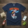 Navy blue t-shirt with "Rizz Sauce Add Zest to Mid Conversations 67" text, featuring a rocket and sauce bottle graphic