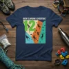 T-shirt featuring "ROCK CLIMBING ADVENTURE 12" text with silhouettes of climbers on a colorful wall