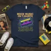 Rock Music On T-Shirts 1984 design featuring a retro cassette tape and vibrant neon lines