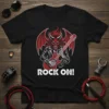 Rock On! T-Shirt featuring a devil skull with horns and wings playing a red electric guitar, with white text below