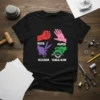 Black t-shirt featuring a graphic parody of Rock Paper Scissors with text ROCK PAPER SCICSCOR TABLE SAW and corresponding hands