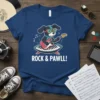 Rock & Pawll! t-shirt design featuring a cartoon dog playing a guitar on a keyboard, with musical notes