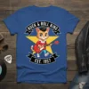 Rock & Roll King Est. 1957 text with a cartoon cat playing guitar on a blue t-shirt