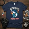 Rock Shark Jawsome Riffs t-shirt design featuring a cartoon shark playing an electric guitar with flames