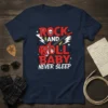 ROCK AND ROLL BABY NEVER SLEEP text with skull, guitar, and musical notes on a navy t-shirt