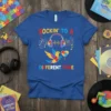 Blue t-shirt with "Rockin' To A Different Tune" text, headphones, bird, and music notes, featuring autism puzzle pieces