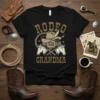 Rodeo Grandma t-shirt design featuring a cowboy hat, belt buckle, and horse heads with crossed lassos