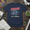T-shirt with "ROOMS ARE CHANGING" text above a cityscape graphic representing virtual reality and technology
