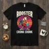 Funny Rooster Cronk Cronk graphic t-shirt with a cartoon chicken and vintage sunset background