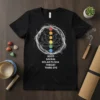 Black t-shirt featuring the text ROOT SACRAL SOLAR PLEXIA THROAT THIRD EYE with a chakra lotus flower design