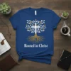 Rooted in Christ t-shirt with a tree graphic featuring a cross in the center and strong roots, on a navy