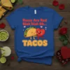 Roses Are Red Blah Blah Bh... TACOS text with a cute taco and heart graphic on a blue t-shirt