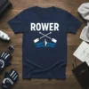 Navy blue t-shirt with "ROWER" text in white and crossed oars over blue waves graphic