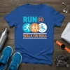 Blue t-shirt with "RUN 5K WALK OR ROLL" text and icons for running, walking, and wheelchair users