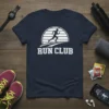 Run Club t-shirt with white text and runner graphic against a sun-like background