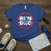 RUN DNC graphic t-shirt featuring a runner silhouette inside a red circle, designed for runners and fitness enthusiasts