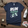Run Mama t-shirt with white text and green cursive "mama," featuring green running shoes on a checkered track graphic