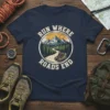 Run Where Roads End hiking t-shirt featuring a mountain landscape, pine trees, and hiking boots
