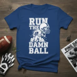 Run The Darn Ball football player graphic with helmet and football on a blue t-shirt