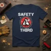 Safety Third t-shirt design with a stick figure welding and a warning triangle graphic