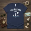 Sag Harbor 1963 lighthouse and sailboat graphic t-shirt design in white text and graphics on navy blue