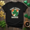 Black t-shirt with "Saint Paddy Baddies" text, a shamrock, and Irish flag colors in a shield design
