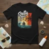 Black t-shirt featuring "Salty Breeze" text with a retro sunset, sailboat, and ocean wave graphic