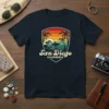 San Diego California surf t-shirt design with a surfer, palm trees, and ocean waves against a sunset sky