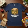 Sandwich Squad t-shirt design featuring a stack of delicious sandwiches and bold text