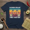 Sashimi Rollin' They Hattin' funny sushi graphic t-shirt design with sushi pieces riding a tandem bicycle