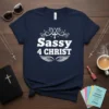 Sassy 4 CHRIST t-shirt with white typography and wing graphic, featuring a cross and decorative elements