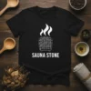 Sauna Stone t-shirt design featuring a graphic of hot stones in a basket with steam, and the text SAUNA STONE