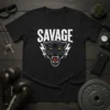 Black t-shirt with white text "SAVAGE" above a fierce black panther head with yellow eyes and lightning bolts