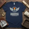 Savannah Freedom Exchange T-Shirt with winged torch logo and text in white