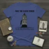 Blue t-shirt featuring the text "SAVE THE CLOCK TOWER" and "PLEASE MAKE DONATIONS TO The Hill Valley Preservation Society" with