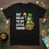 Say Hello To My Little Friend St. Patrick's Day t-shirt design with a leprechaun holding a shamrock over a treasure