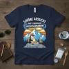 T-shirt with German text "Schöne Aussicht gibt's hier auch Kaiserschmarrn?" showing a penguin eating Kaiserschmarrn with mountains in background