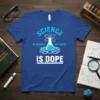 Blue t-shirt with "Science In Science We Trust Is Dope" text, featuring a beaker and atomic symbol graphic