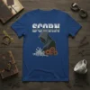 Scorn text above a dark hooded figure breaking apart with steampunk gears below, on a blue t-shirt