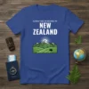 T-shirt with text "SCREW THIS I'M MOVING TO NEW ZEALAND" above a graphic of mountains, sun, and a kiwi bird