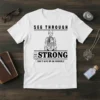 White t-shirt with "See Through Strong Don't Give Up On Yourself" text and skeleton graphic